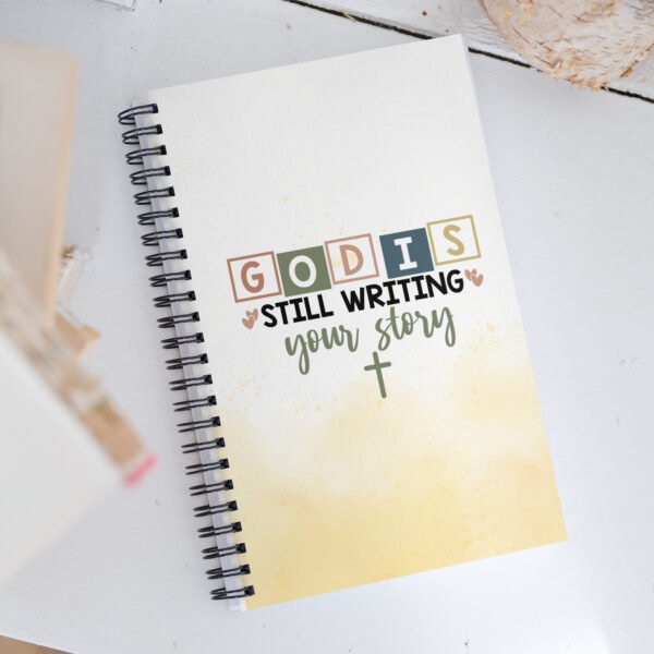 God is Still Writing - Spiral notebook - Image 2